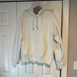 Champion hoodie in white size men’s large.